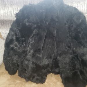 Waist length black fur